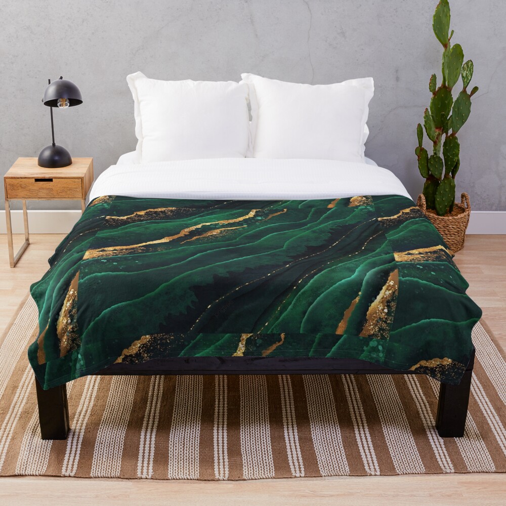 Emerald green and gold flowy marble print on shirts, blankets