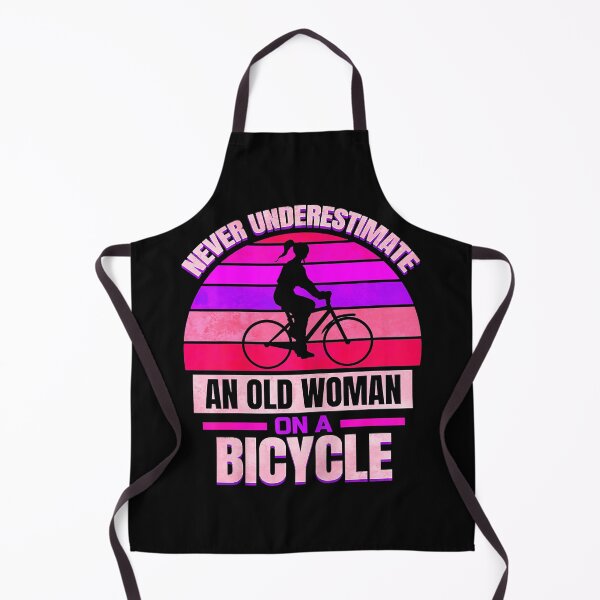 Item preview, Never Underestimate an Old Woman On A Bicycle designed and sold by spherevilla.