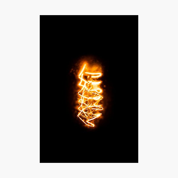 The electrical orange filament of a light bulb in a photo Photographic Print