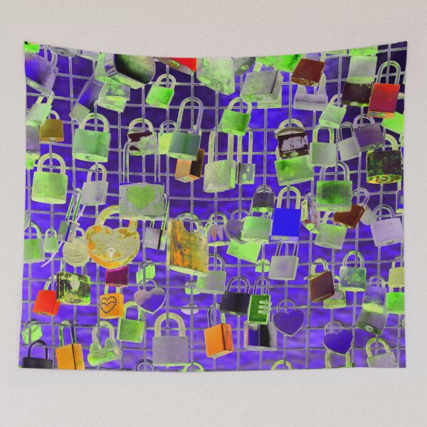Item preview, Colorful love padlocks as a couples commitment sign hanging  on the fence of the love bridge with a dark royal blue background behind designed and sold by IraNiva.