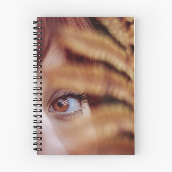 Item preview, Golden eyes, shinning through vegetation, brown and warm, close up. designed and sold by AylaHarbich.