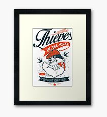 Raccoon thief Framed Print