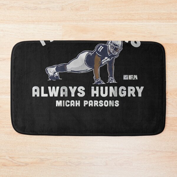 Item preview, Micah Parsons push ups Essential T-Shirt.png designed and sold by Connienderson.