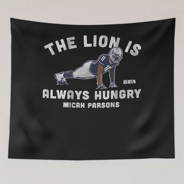 Item preview, Micah Parsons push ups Essential T-Shirt.png designed and sold by Connienderson.