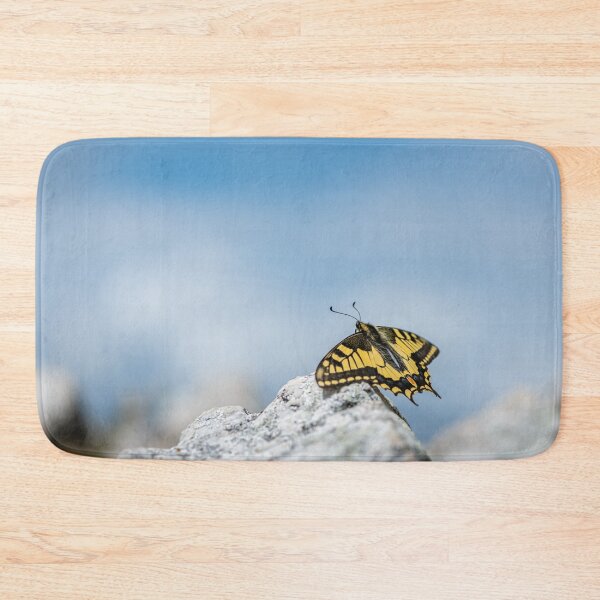 Item preview, An Old World swallowtail butterfly resting on a stone designed and sold by Stefan Rotter.