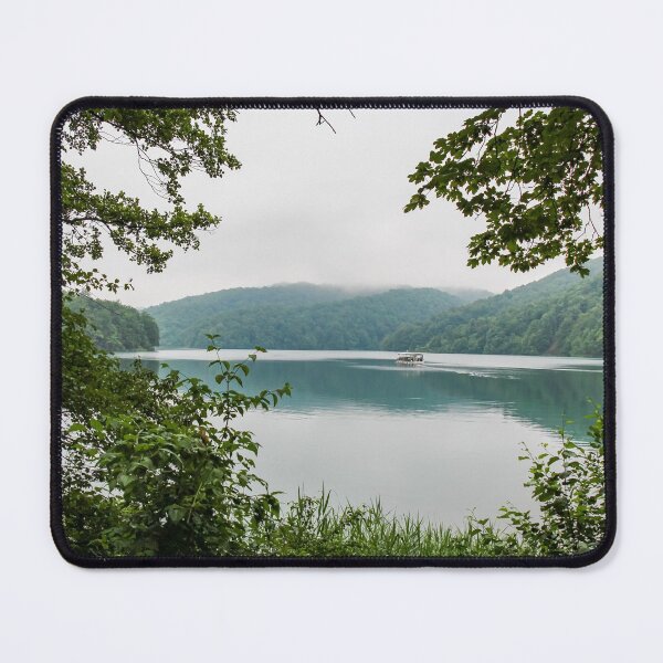 Item preview, A view across Lake Kozjak with a tourist boat in the background, Plitvice Lakes, Croatia designed and sold by SnapTPhotograph.