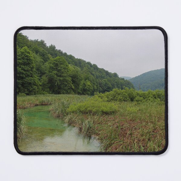 Item preview, A clear green stream flowing through a reed bed into Lake Kozjak, Plitvice Lakes, Croatia designed and sold by SnapTPhotograph.