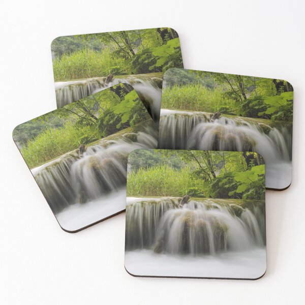 Item preview, Long exposure of water flowing over a small waterfall at Plivice Lakes, UNESCO World Heritage Site, Croatia designed and sold by SnapTPhotograph.