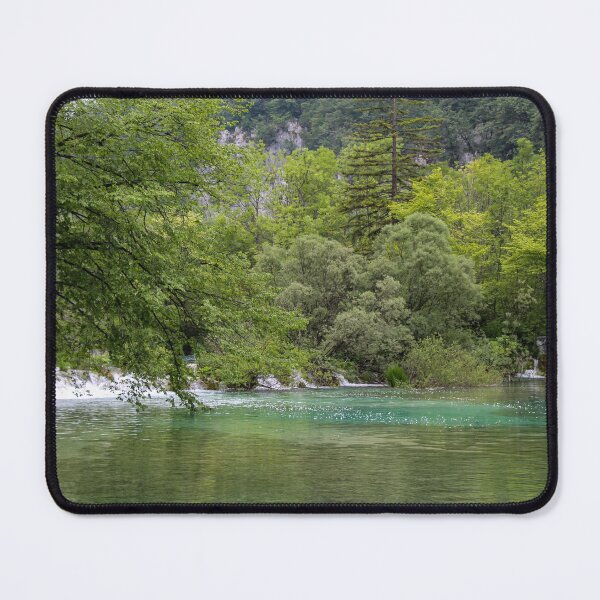 Item preview, A lake at Plitvice Lakes, with a waterfall and woodland in the background, Croatia designed and sold by SnapTPhotograph.