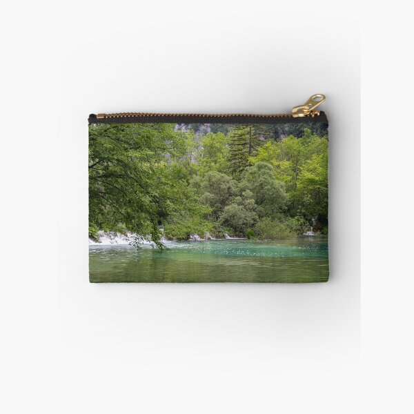 Item preview, A lake at Plitvice Lakes, with a waterfall and woodland in the background, Croatia designed and sold by SnapTPhotograph.