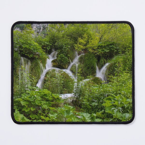 Item preview, Water flowing through vegetation and over a waterfall at Plitvice Lakes, Croatia designed and sold by SnapTPhotograph.