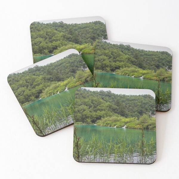 Item preview, A view of a green lake over reeds with a waterfall in the background, Plitvice Lakes, Croatia designed and sold by SnapTPhotograph.