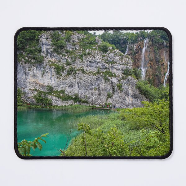 Item preview, A large waterfall flowing over a mountain into a lake at Plitvice Lakes, UNESCO World Heritage Site, Croatia designed and sold by SnapTPhotograph.