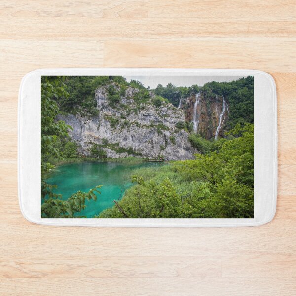 Item preview, A large waterfall flowing over a mountain into a lake at Plitvice Lakes, UNESCO World Heritage Site, Croatia designed and sold by SnapTPhotograph.