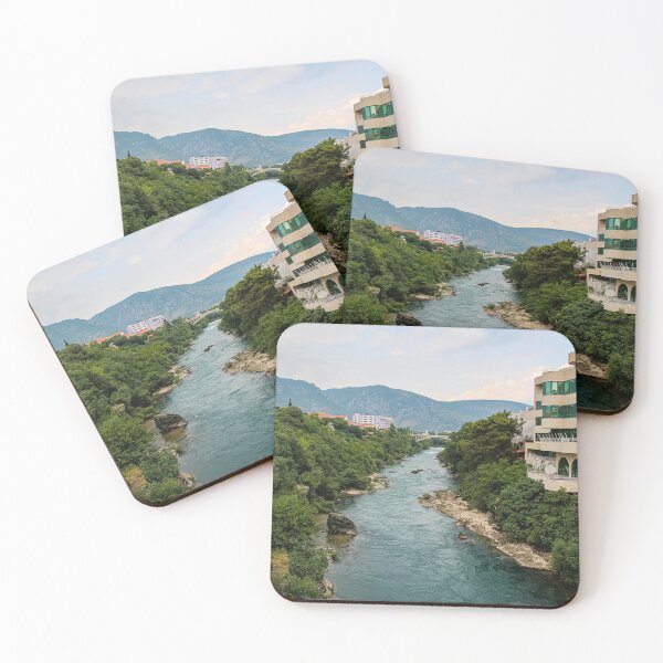 Item preview, The treelined fast flowing Neretva river in Mostar, with Rastani mountains in the background, Bosnia and Herzegovina designed and sold by SnapTPhotograph.