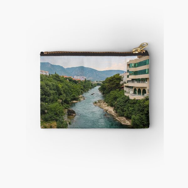 Item preview, The treelined fast flowing Neretva river in Mostar, with Rastani mountains in the background, Bosnia and Herzegovina designed and sold by SnapTPhotograph.