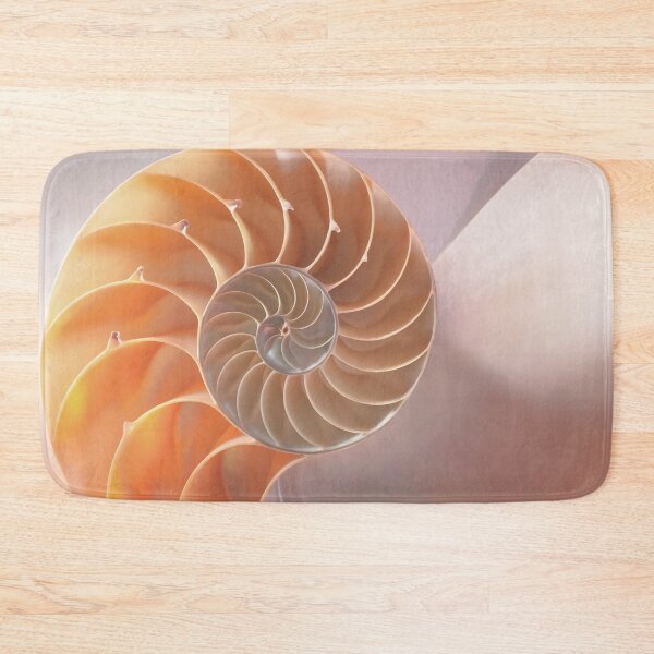 Item preview, Shell cross section fractal spiral in soft pastel cream and orange tones designed and sold by Orianah.