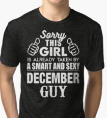 SORRY THIS GIRL IS ALREADY TAKEN BY A SMART AND SEXY DECEMBER GUY Tri-blend T-Shirt