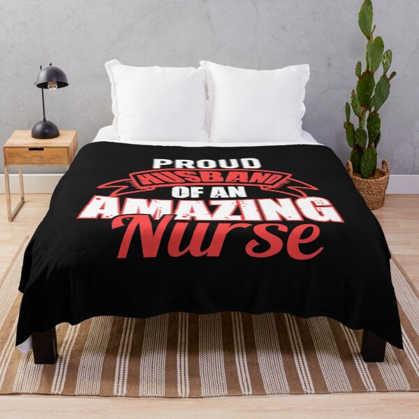 Item preview, Nurse Typographic T-Shirt - Proud Husband Of An Amazing Nurse T-Shirt designed and sold by iconra.