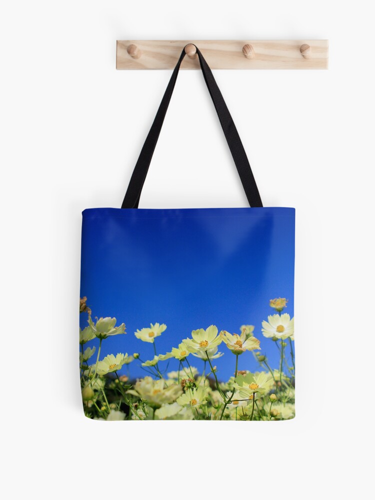 Thumbnail 1 of 2, Tote Bag, Lovely Yellow Cosmos Clear Blue Sky Flower Field designed and sold by beverlyclaire.