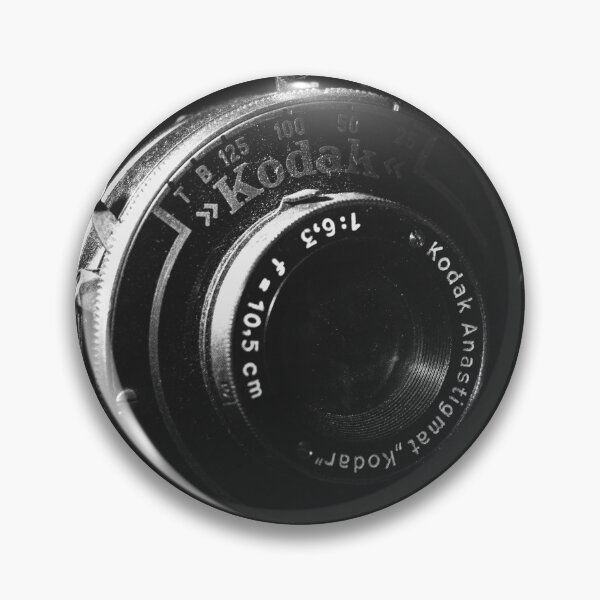 Item preview, A black and white close-up photo of a vintage analog camera designed and sold by Diana van Neck.