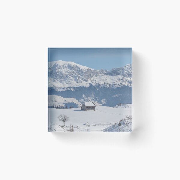 Item preview, Winter landscape with an old house and Bucegi mountains in the background designed and sold by sonyc.