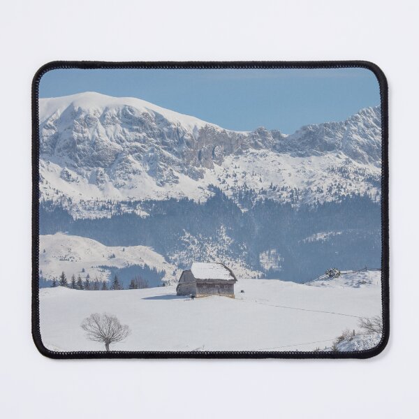 Item preview, Winter landscape with an old house and Bucegi mountains in the background designed and sold by sonyc.