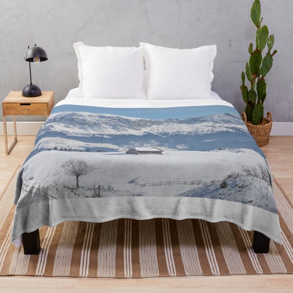 Item preview, Winter landscape with an old house and Bucegi mountains in the background designed and sold by sonyc.