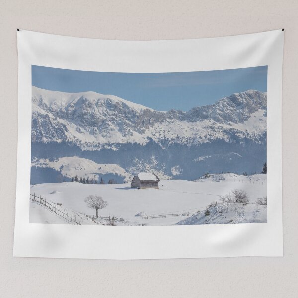 Item preview, Winter landscape with an old house and Bucegi mountains in the background designed and sold by sonyc.