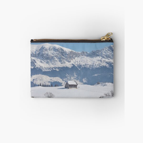 Item preview, Winter landscape with an old house and Bucegi mountains in the background designed and sold by sonyc.