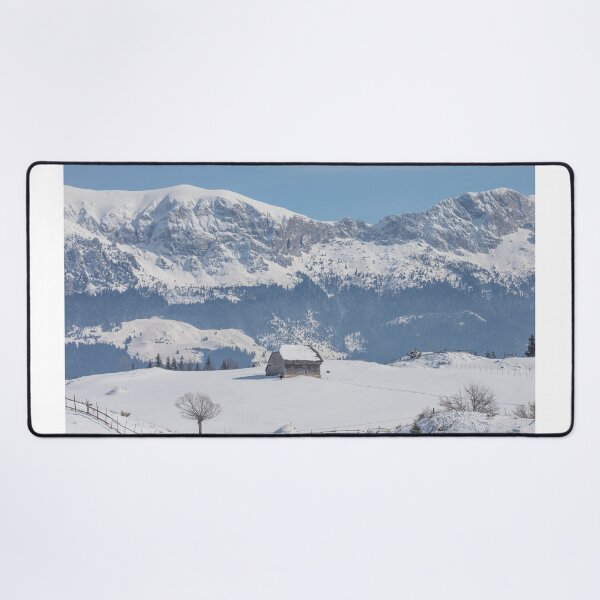 Item preview, Winter landscape with an old house and Bucegi mountains in the background designed and sold by sonyc.
