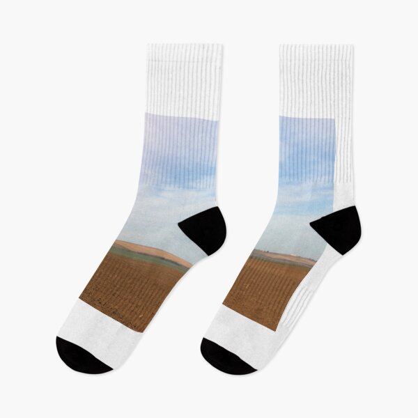 Item preview, The drone is flying over the plowed field in springtime designed and sold by goceris.