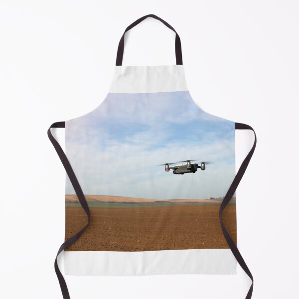 Item preview, The drone is flying over the plowed field in springtime designed and sold by goceris.