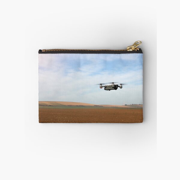 Item preview, The drone is flying over the plowed field in springtime designed and sold by goceris.