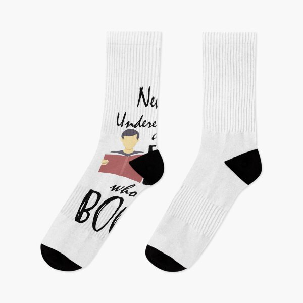 Item preview, NEVER UNDERESTIMATE A BOY WHO LOVES BOOKS designed and sold by Innovational.