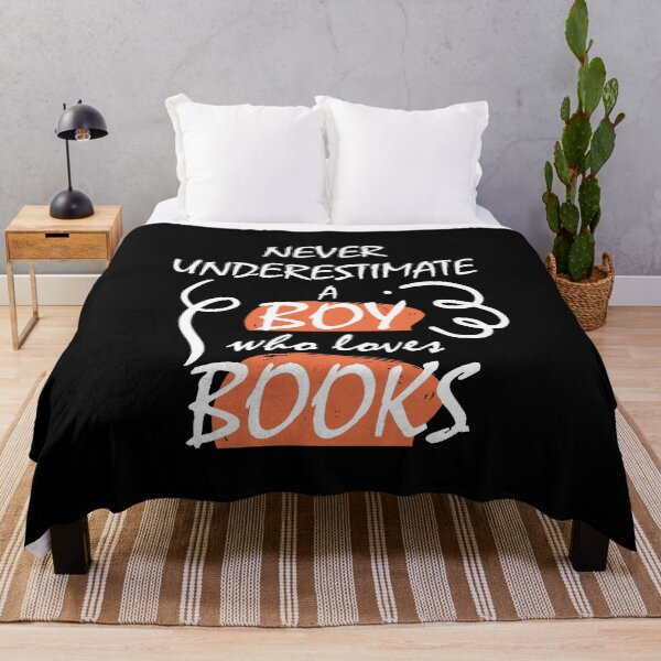 Item preview, NEVER UNDERESTIMATE A BOY WHO LOVES BOOKS designed and sold by Innovational.