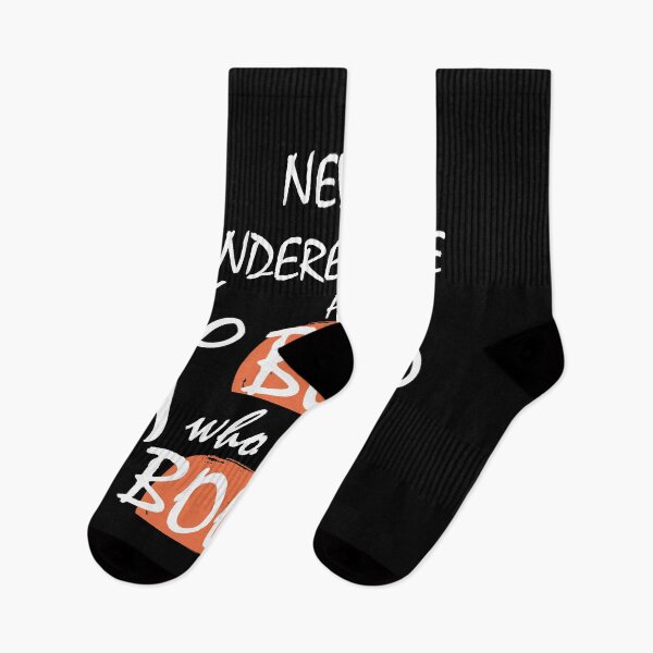 Item preview, NEVER UNDERESTIMATE A BOY WHO LOVES BOOKS designed and sold by Innovational.