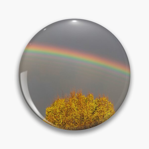 Item preview, Vibrant rainbow arching over colourful fall leaves designed and sold by Rod Raglin.