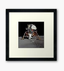 An Apollo 11 astronaut in front of the lunar module. Framed Print