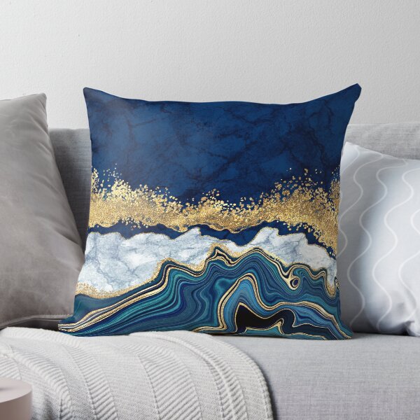 Blue and store gold throw pillows