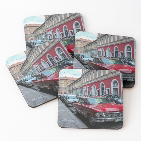 Item preview, Vintage red cadillac deville car parked in a Budapest street in the evening designed and sold by SnapTPhotograph.