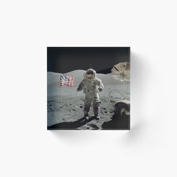 Apollo 17 astronaut stands near the American flag on the lunar surface. Acrylic Block