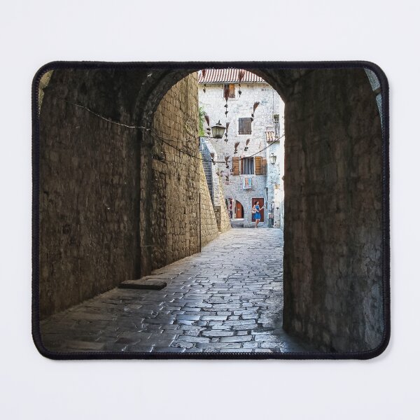 Item preview, An alley way in the old town of Kotor, with flying brooms in the background designed and sold by SnapTPhotograph.