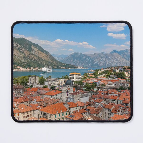 Item preview, The old town of Kotor by the sea at Kotor Bay, with a ferry arriving, Montenegro designed and sold by SnapTPhotograph.