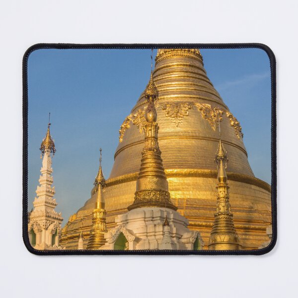 Item preview, Evening light falling on the golden Shwedagon Pagoda in Yangon, with a blue sky background designed and sold by SnapTPhotograph.
