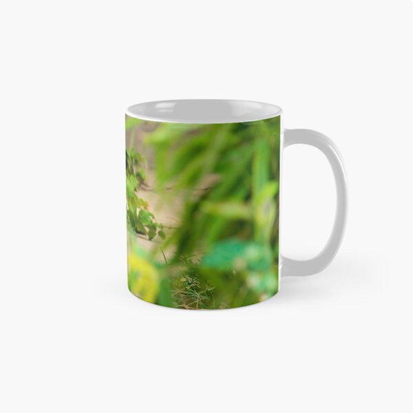 Item preview, A baby tiger peeks through the brush designed and sold by noblephoto.