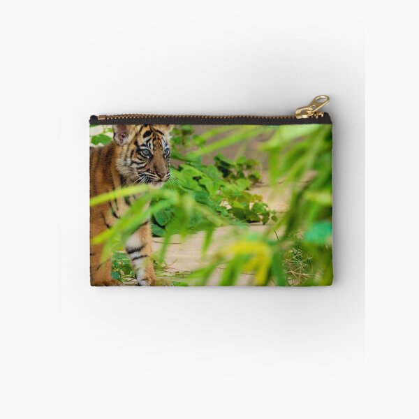 Item preview, A baby tiger peeks through the brush designed and sold by noblephoto.