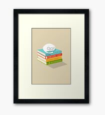 The Cat Loves Books Framed Print