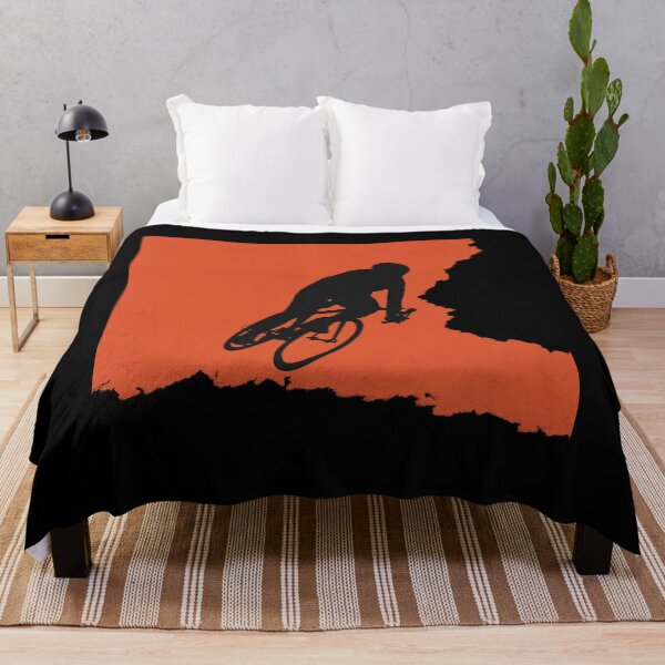 Item preview, Bikerider rides the bicycle, black silhuette on orange background designed and sold by marina63.