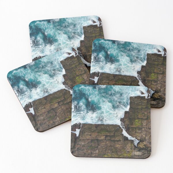 Item preview, Clear blue water breaking onto rocks  designed and sold by jemmurphy23.